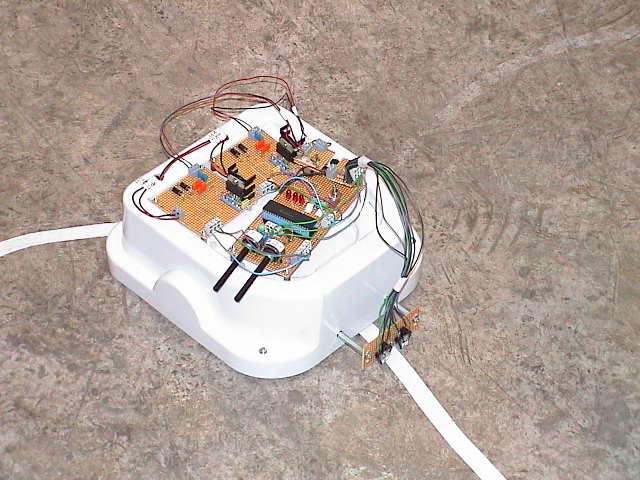 P068-04-06-2002-robot-on-the-ground.jpg